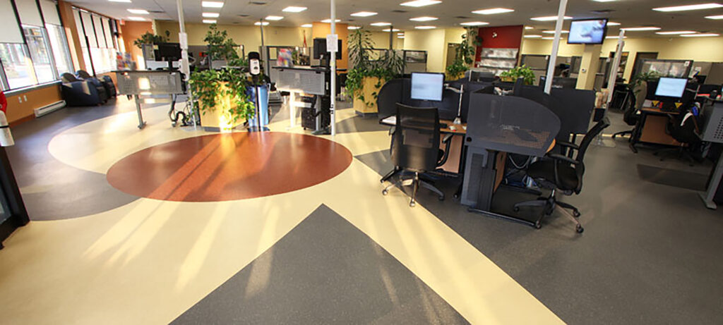 Canadian Government Offices With Desks & Plants.